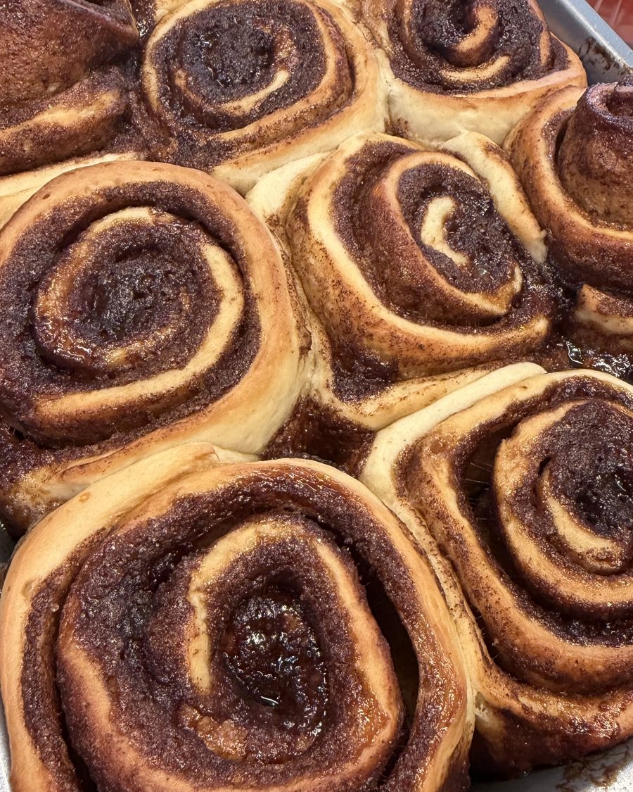 Close-up of cinnamon roll swirls in the pan
